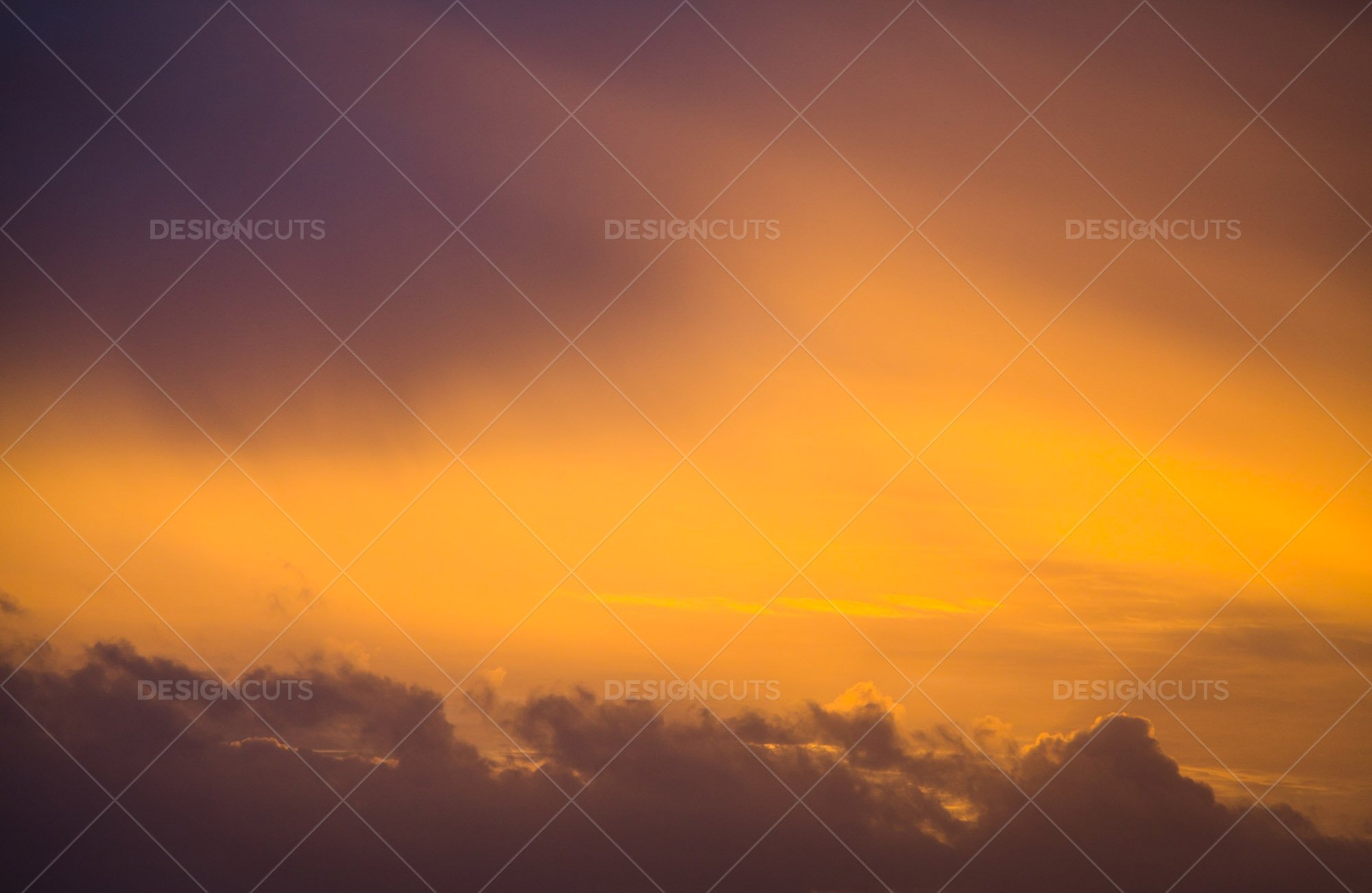 Aerial View Of Clouds At Sunset